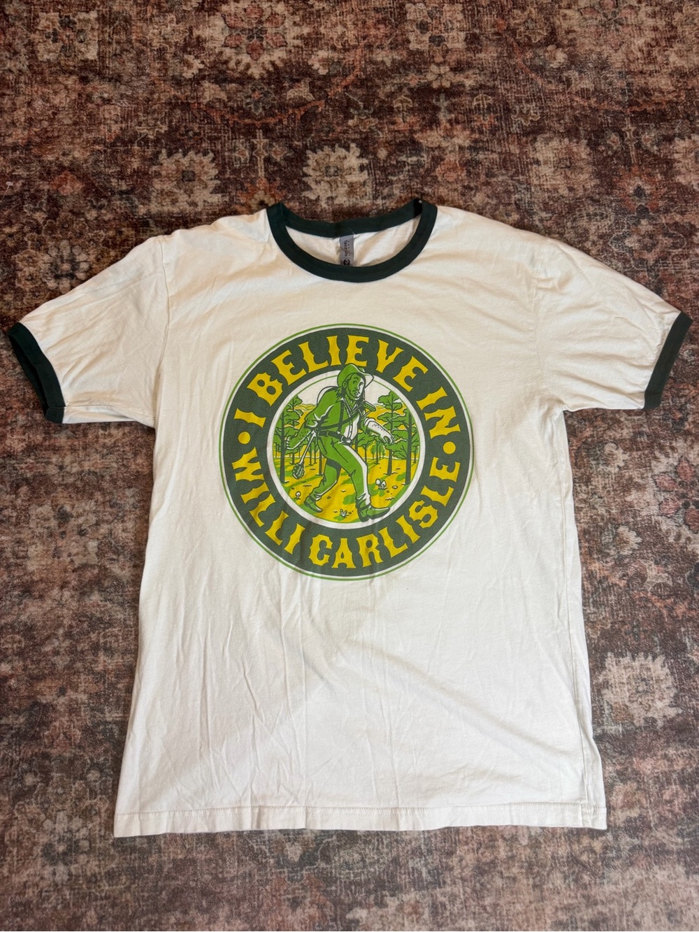 Next Level Apparel White Ringer Tee with Green & Yellow Graphic